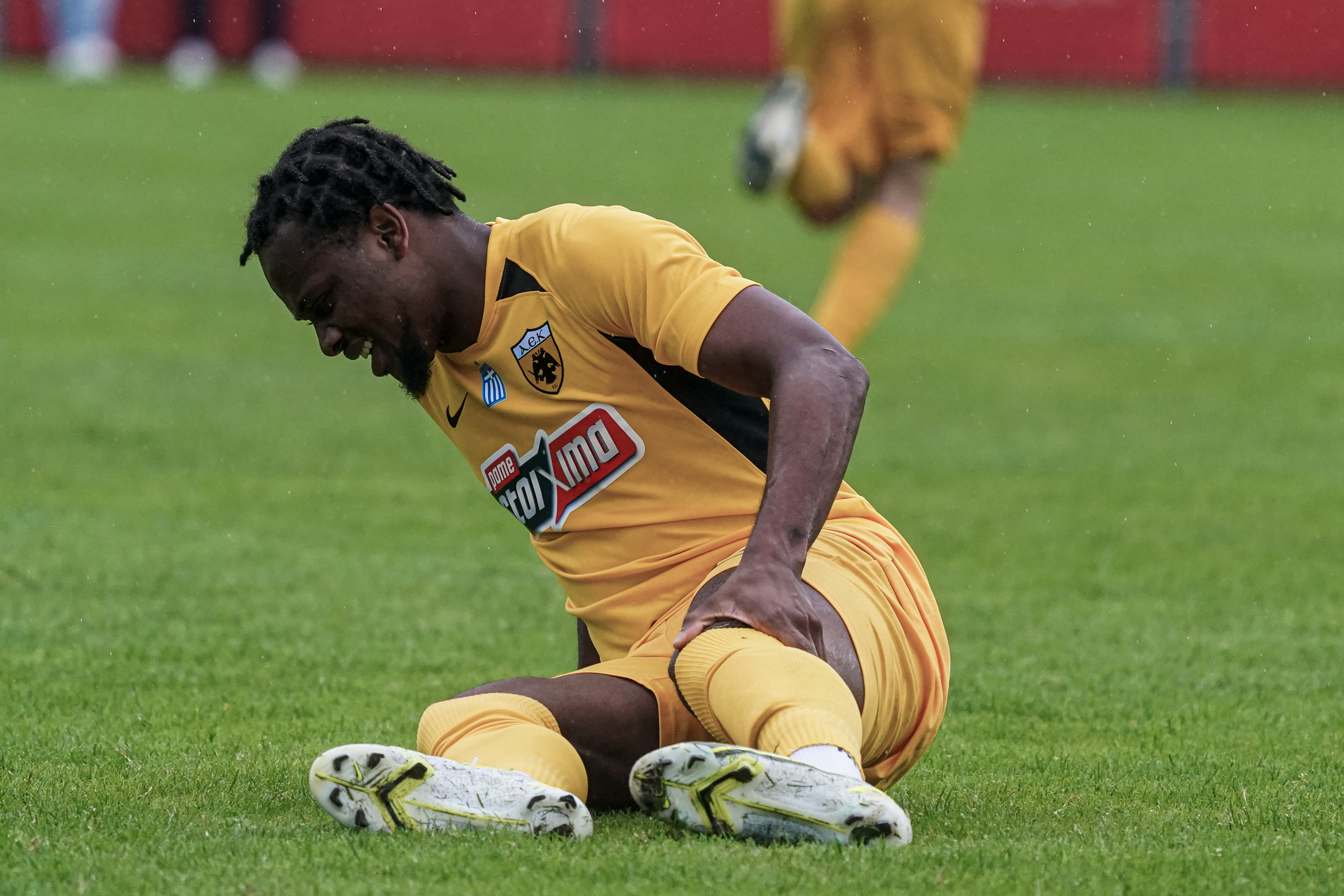 03-07-2021 Voetbal PSV v RWD Molenbeek EindhovenGILZERIJEN, NETHERLANDS - JULY 6: Levi Garcia of AEK Athens lays on the ground injured during the friendly match between Royal Antwerp FC and AEK Athene at Sportpark Verhoven on July 6, 2021 in Gilzerijen, Netherlands (Photo by Jeroen Meeuwsen/Orange Pictures)