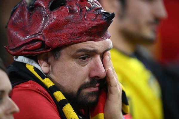 MUNICH, GERMANY - JULY 02: A Belgium fan looks dejected following defeat in the UEFA Euro 2020 Championship Quarter-final match between Belgium and Italy at Football Arena Munich on July 02, 2021 in Munich, Germany. (Photo by Matthias Hangst/Getty Images)