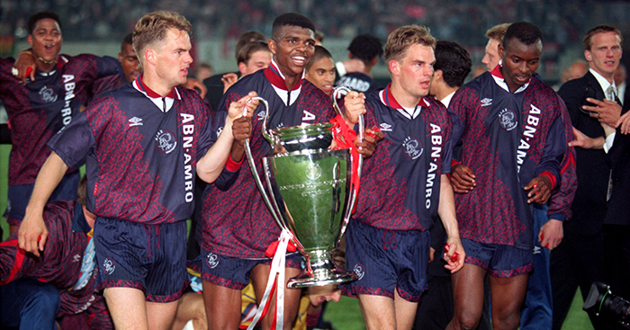 (L-R) Ajax's Frank de Boer, Nwankwo Kanu, Ronald de Boer and Finidi George celebrate with the European Cup